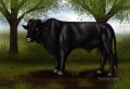 木の下の黒い雄牛